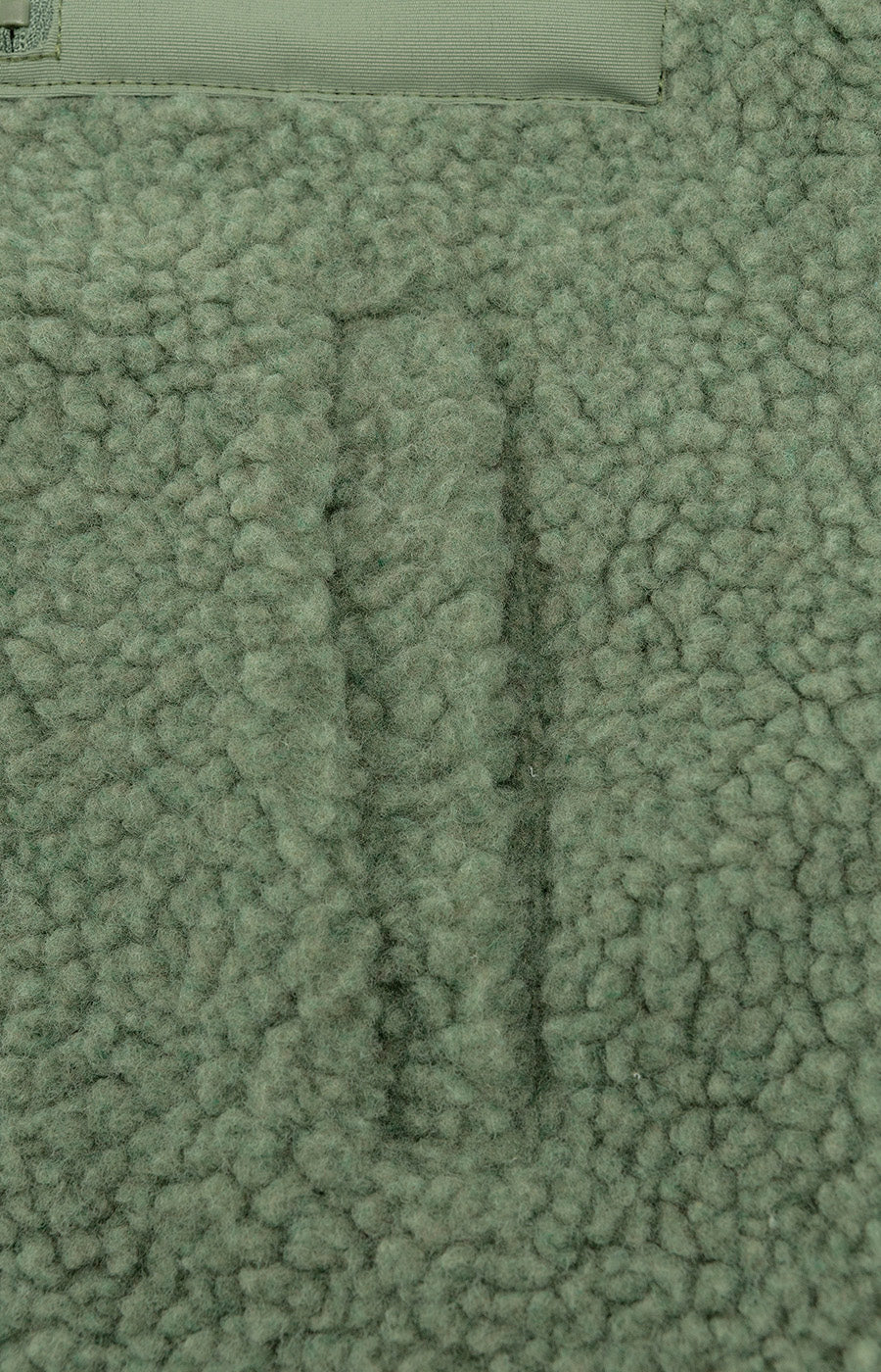 Casaco Sherpa Verde Escuro SCP Criança Pormenor Bolso