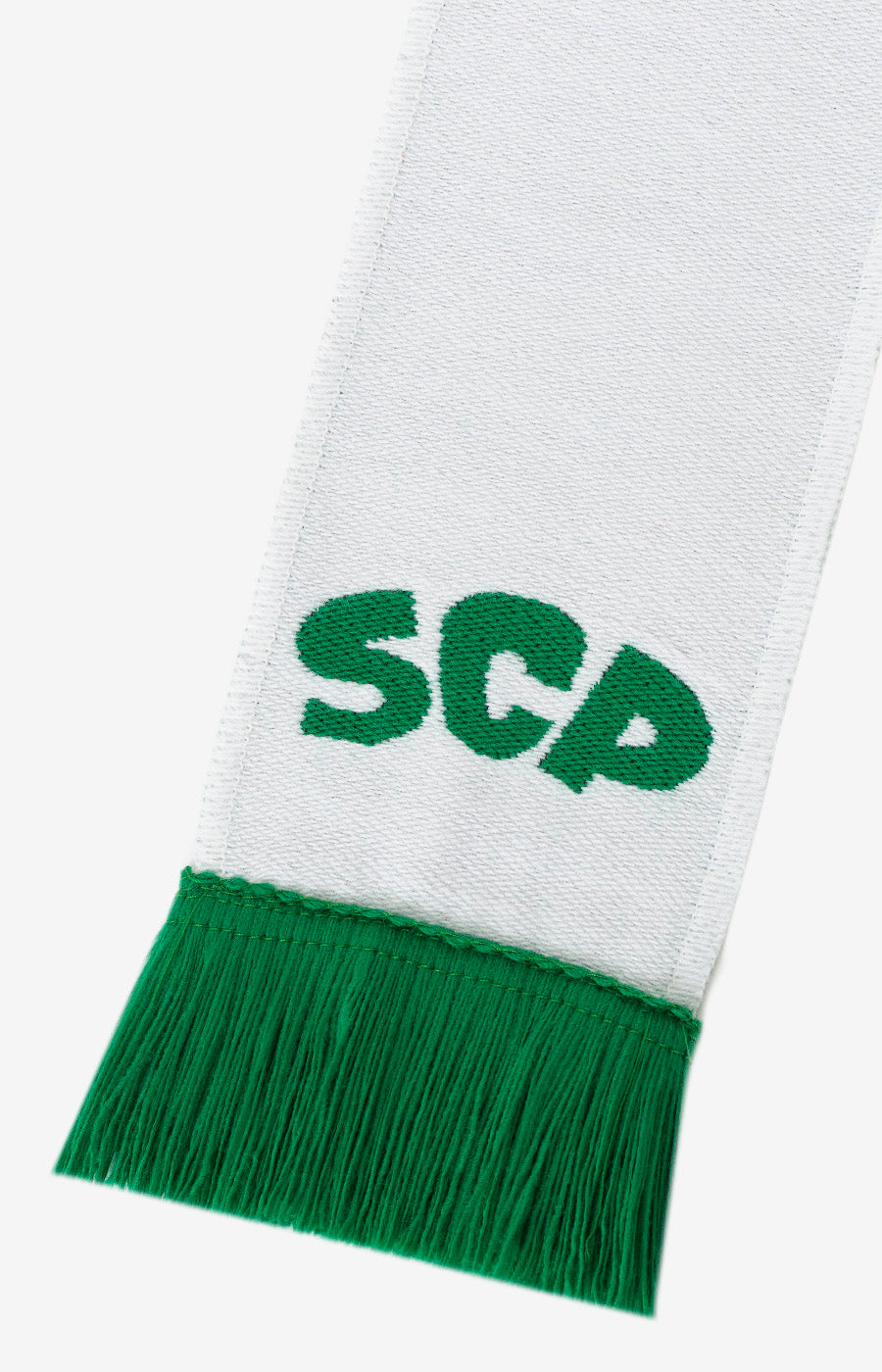 Pormenor da ponta verde do Cachecol Mini Branco do Sporting.