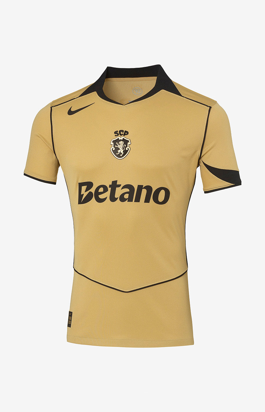 Maillot alternatif doré Nike Total 90 du Sporting 26/27, face avant avec des détails noirs.