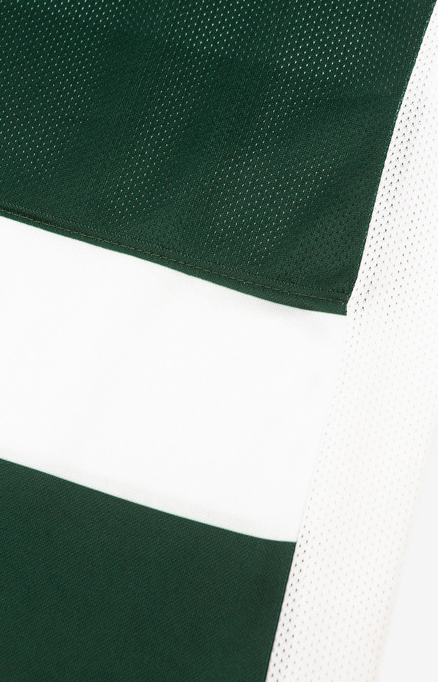 Close-up of the green and white stripes on Sporting's 26/27 Home Jersey.