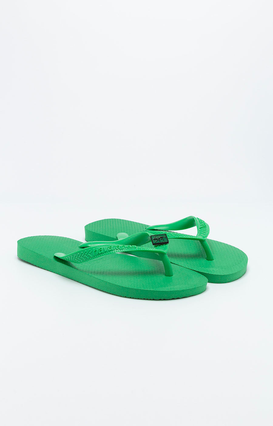 Havaianas Verde Claro Leão do Sporting, par em verde claro com pin do leão na tira.