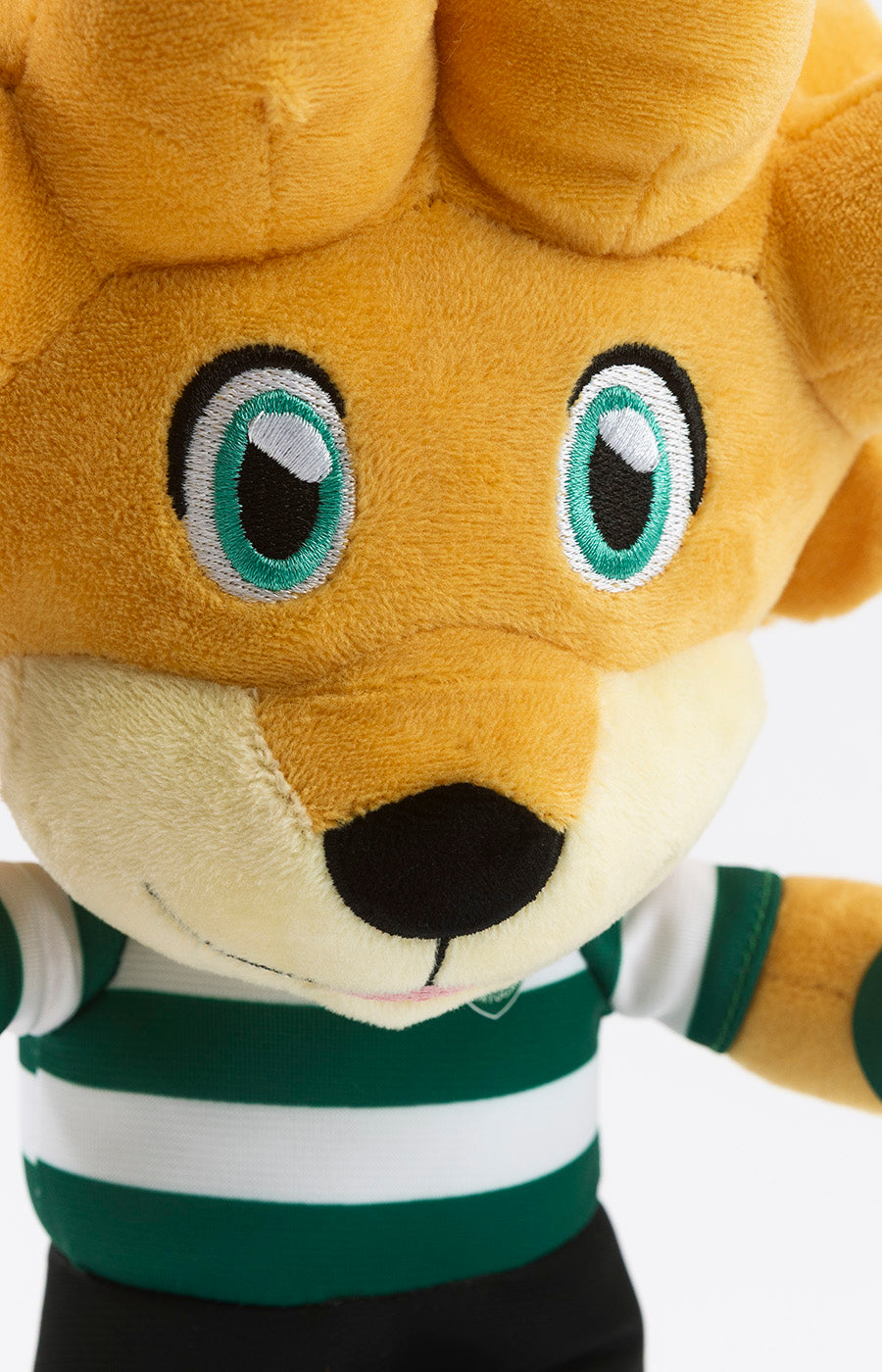 Rosto do Peluche Jubas Pequeno do Sporting, visto de perto.