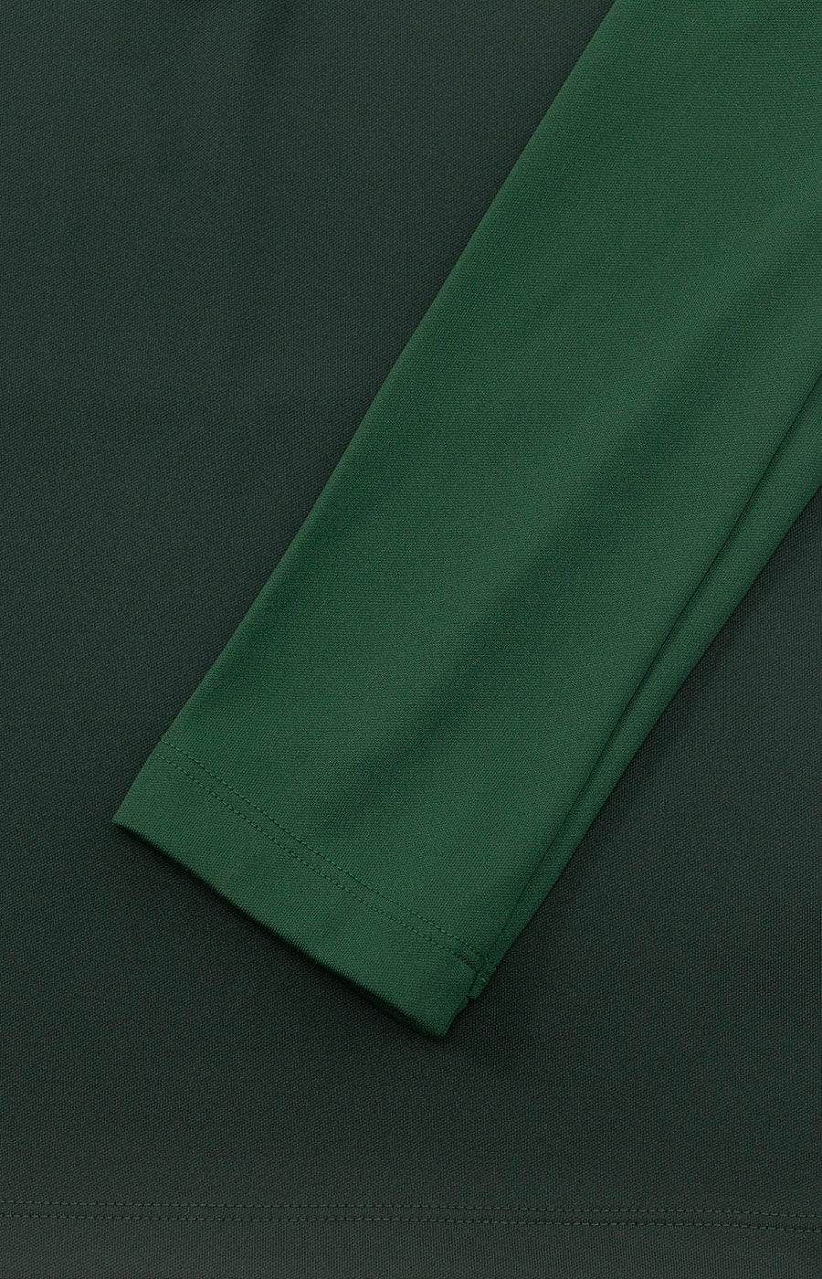 Close-up of the sleeve of the Sporting Kids' Player 26/27 Training Sweatshirt.