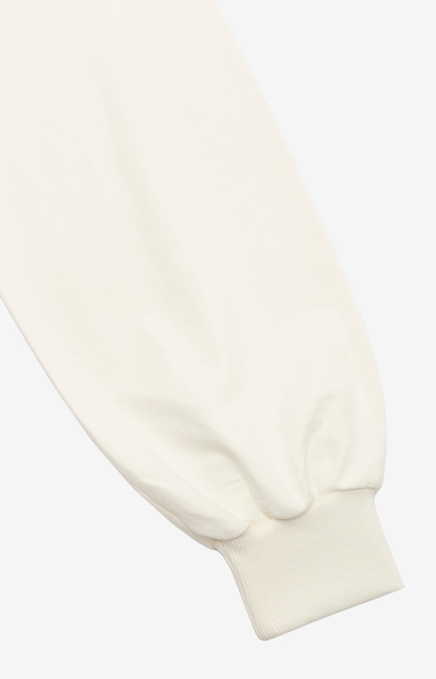 Détail du poignet de la manche du sweat-shirt zippé blanc pour femme du Sporting.