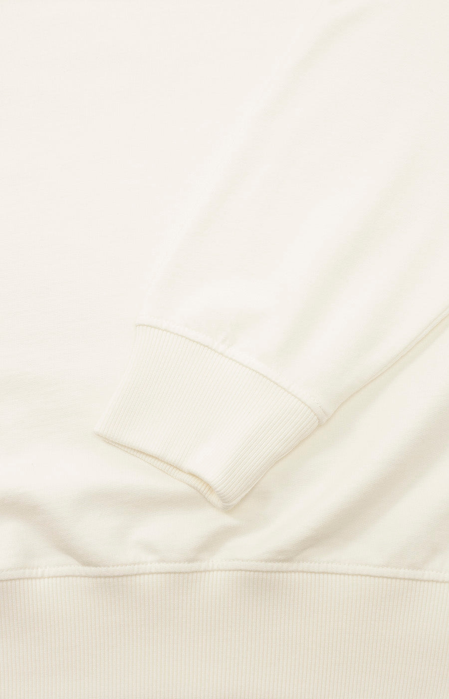 Textura do tecido creme da Sweatshirt Zip Branca do Sporting.